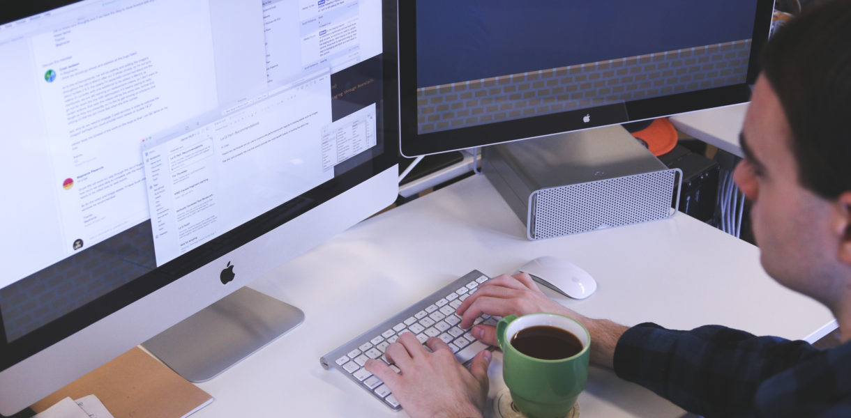 Man at a desk completing a digital maturity assessment