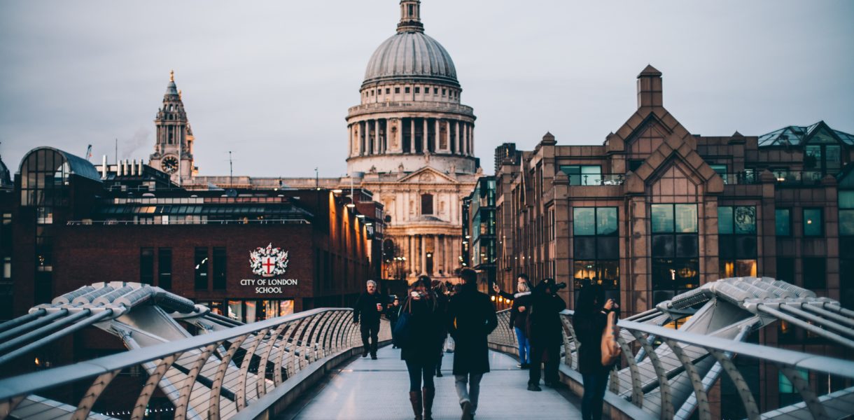 People walking over a bridge