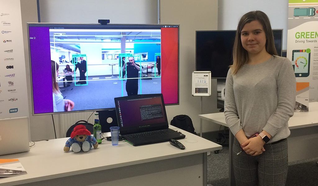 Kari Lawler showcasing her AI work