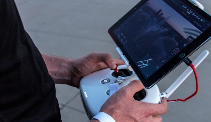 Man operating drone following regulation
