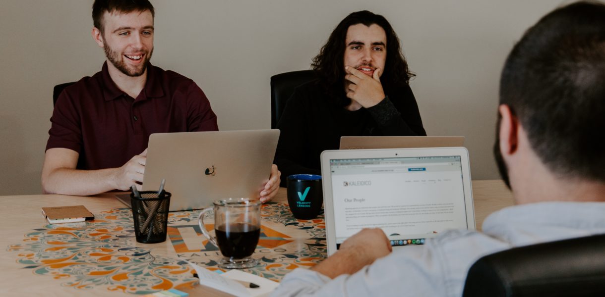 men in meeting
