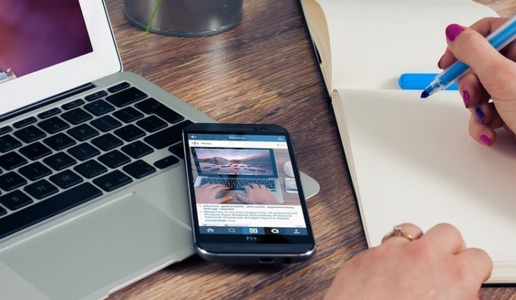 phone and computer on desk