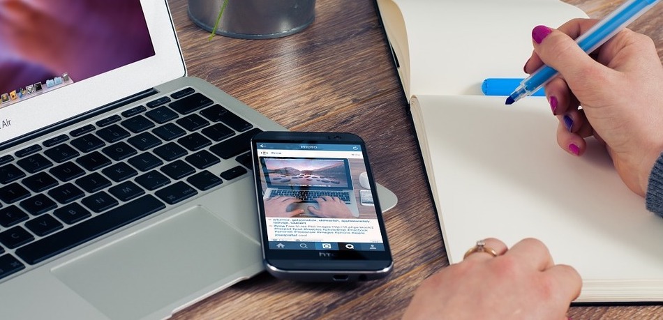 phone and computer on desk
