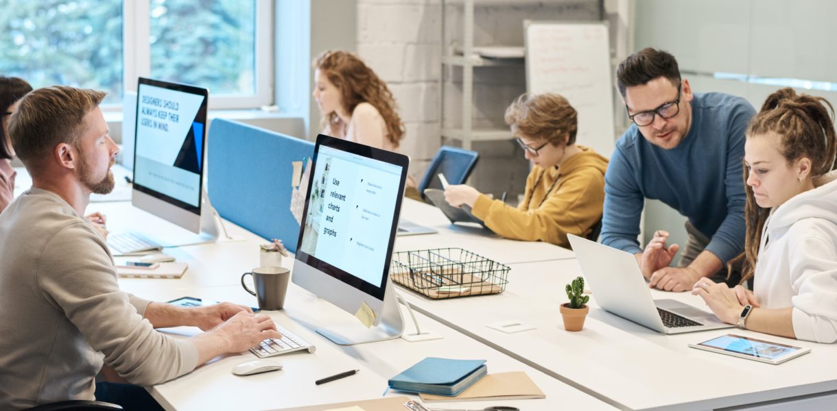 people around a desk