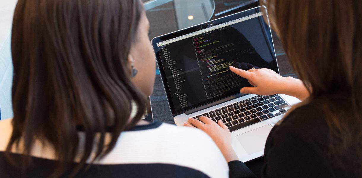 2 Women using a laptop