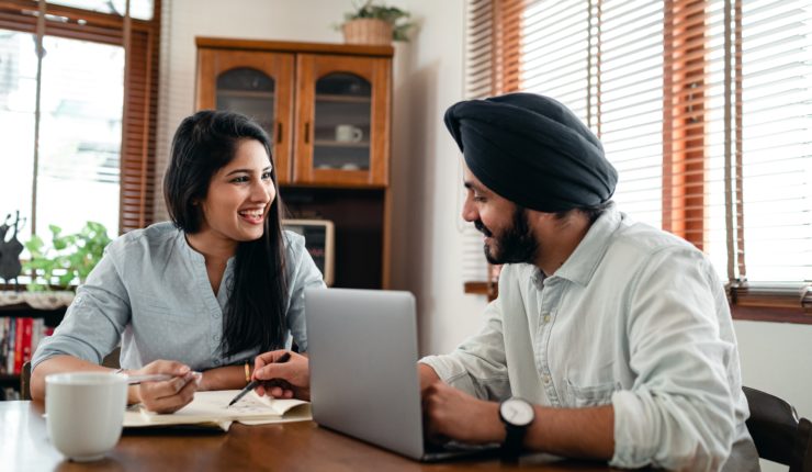 man and woman on laptop