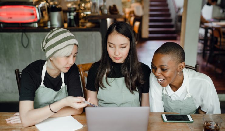 women around laptop