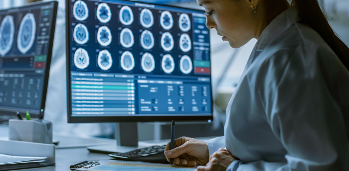 Woman using computers for health data