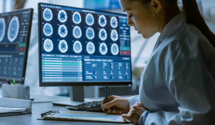 Woman using computers for health data