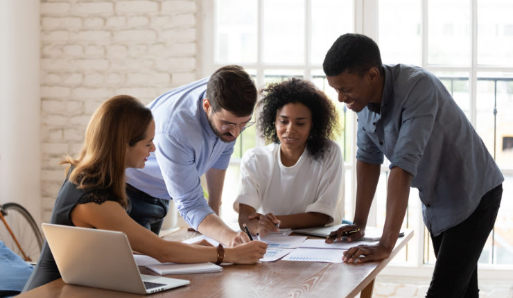 men and women working in the office