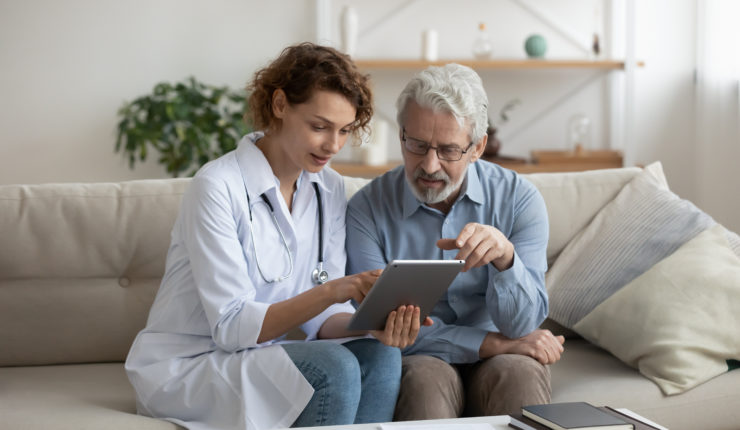 Female,Professional,Doctor,Showing,Medical,Test,Result,Explaining,Prescription,Using