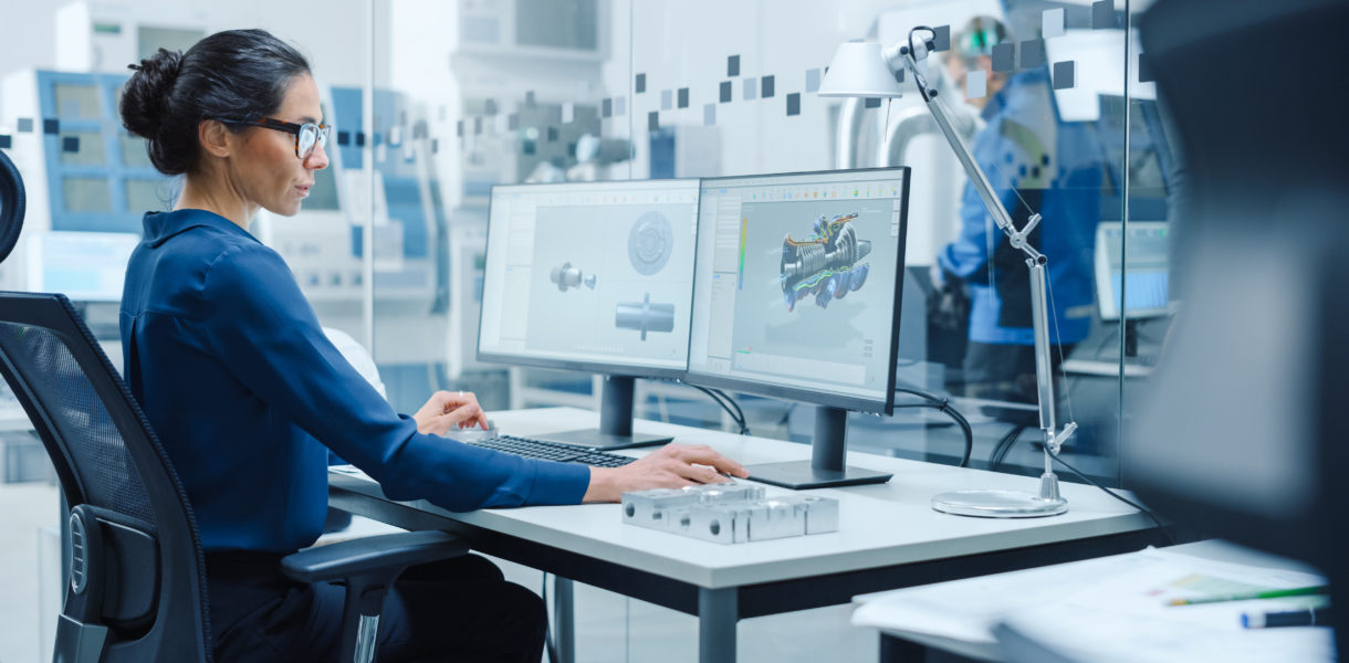 Female,Industrial,Engineer,Solving,Problems,,Working,On,A,Personal,Computer,