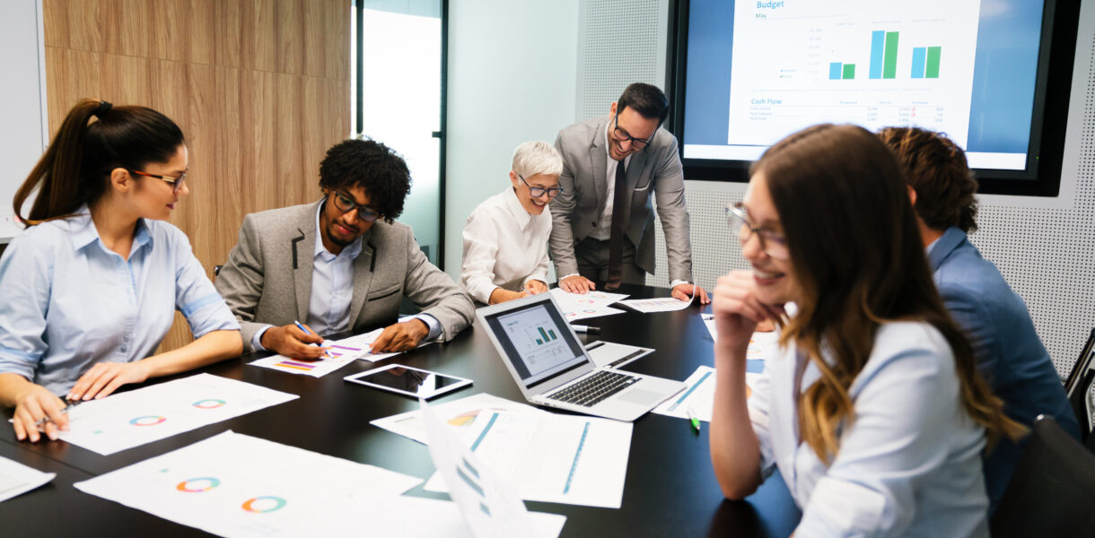 Image,Of,Business,Partners,Discussing,Documents,And,Ideas