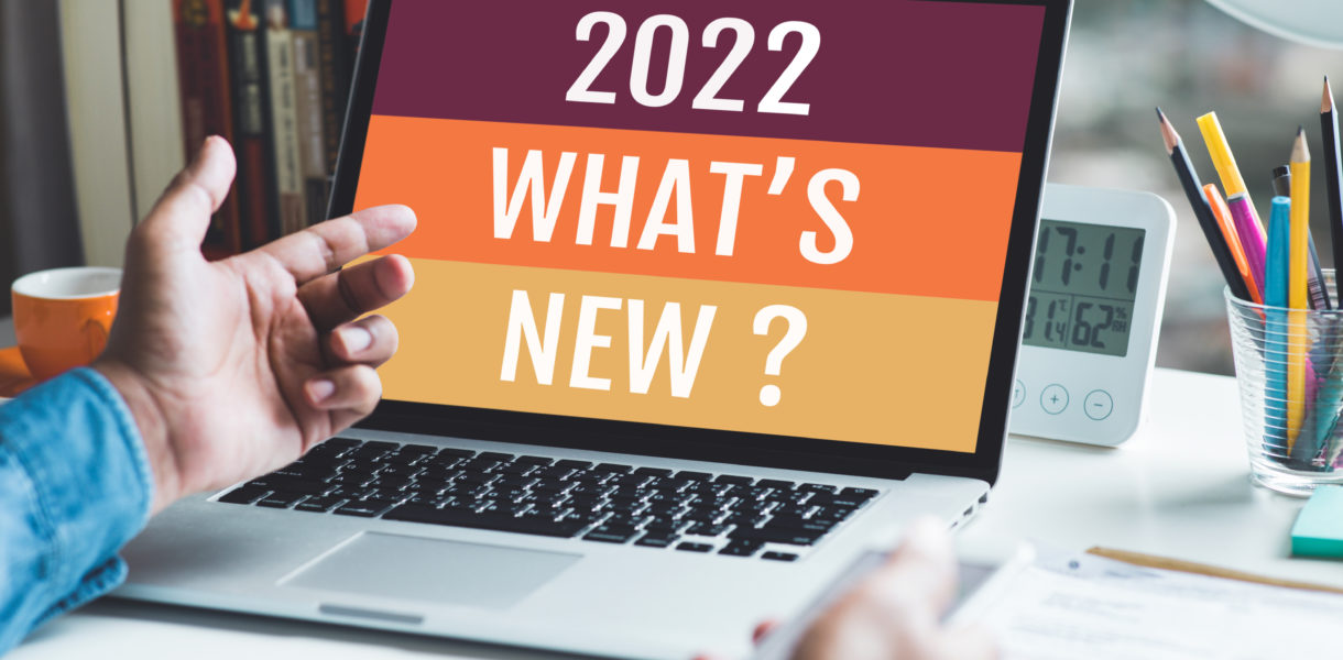 Man looking at laptop that 2022 whats new on the screen