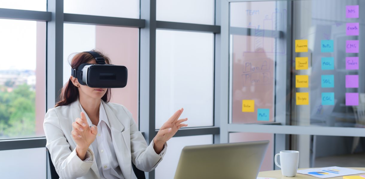 Woman using VR in the office