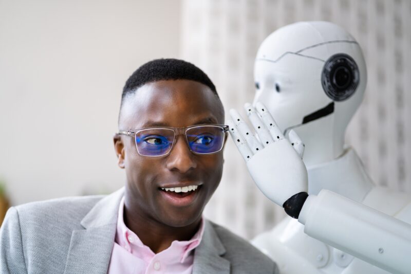 Ai,Cyborg,Robot,Whispering,Secret,Or,Interesting,Gossip,To,African