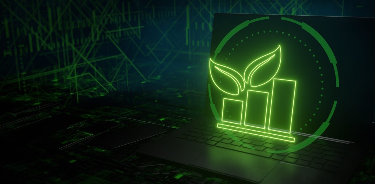 Laptop,Keyboard,With,Plant,Growing,On,It.,Green,It,Computing