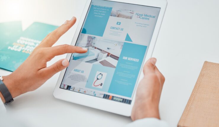 Hands,,Tablet,And,Contact,Us,With,Healthcare,Marketing,Or,Advertising