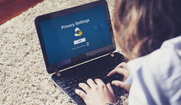 privacy,Settings",On,Laptop,Screen.,Woman,Configures,Internet,Privacy,Settings