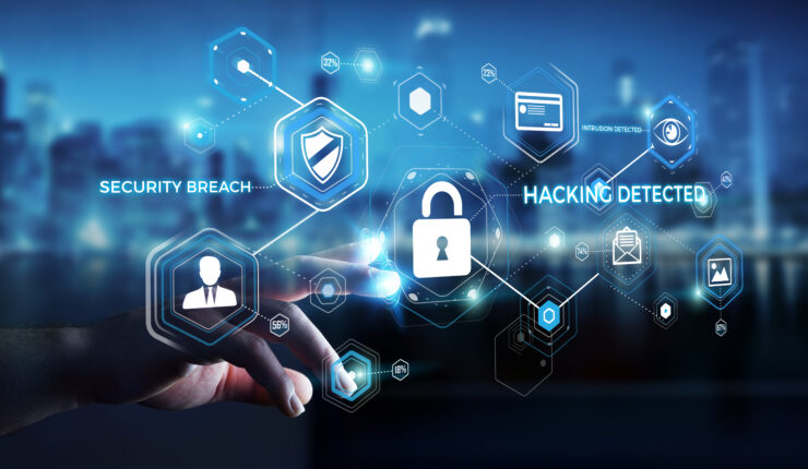 Businessman,On,Blurred,Background,Using,Antivirus,To,Block,A,Cyber